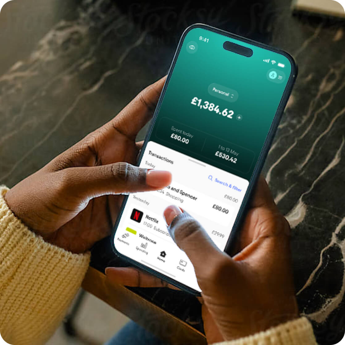 Someone using the Starling app on their phone