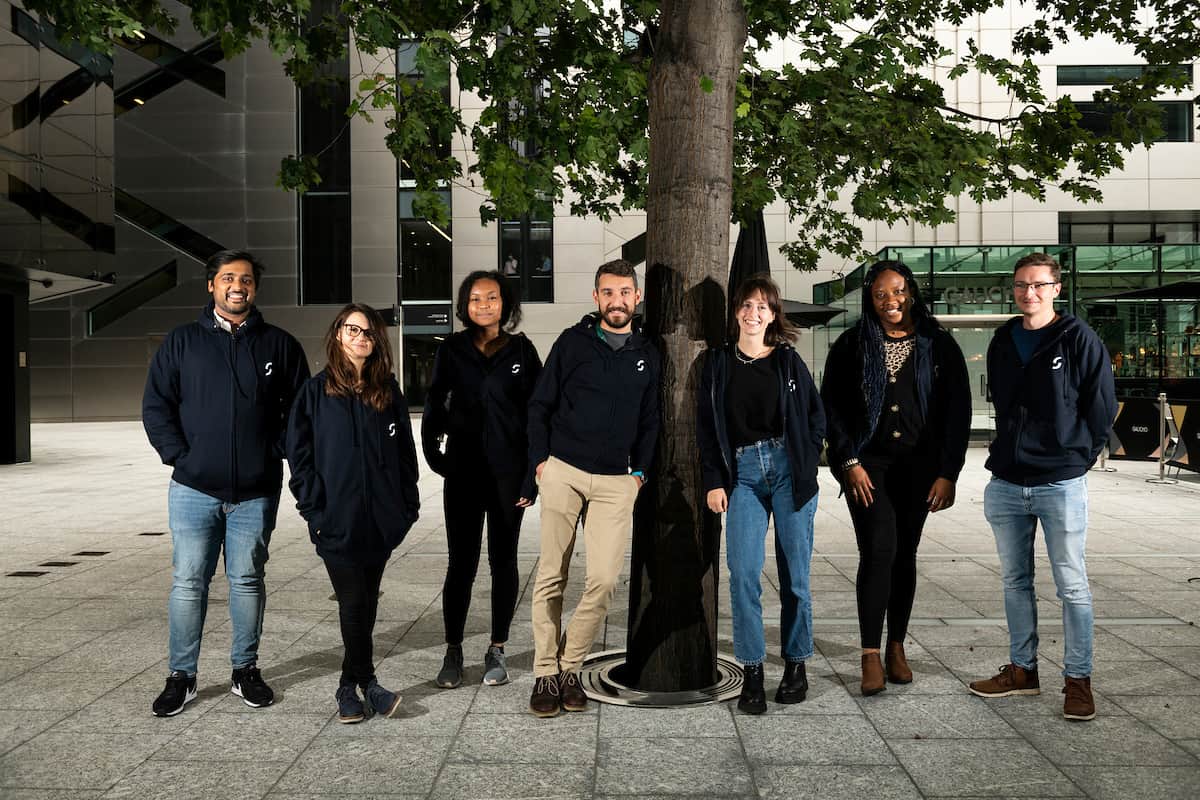 London engineer team in front of office