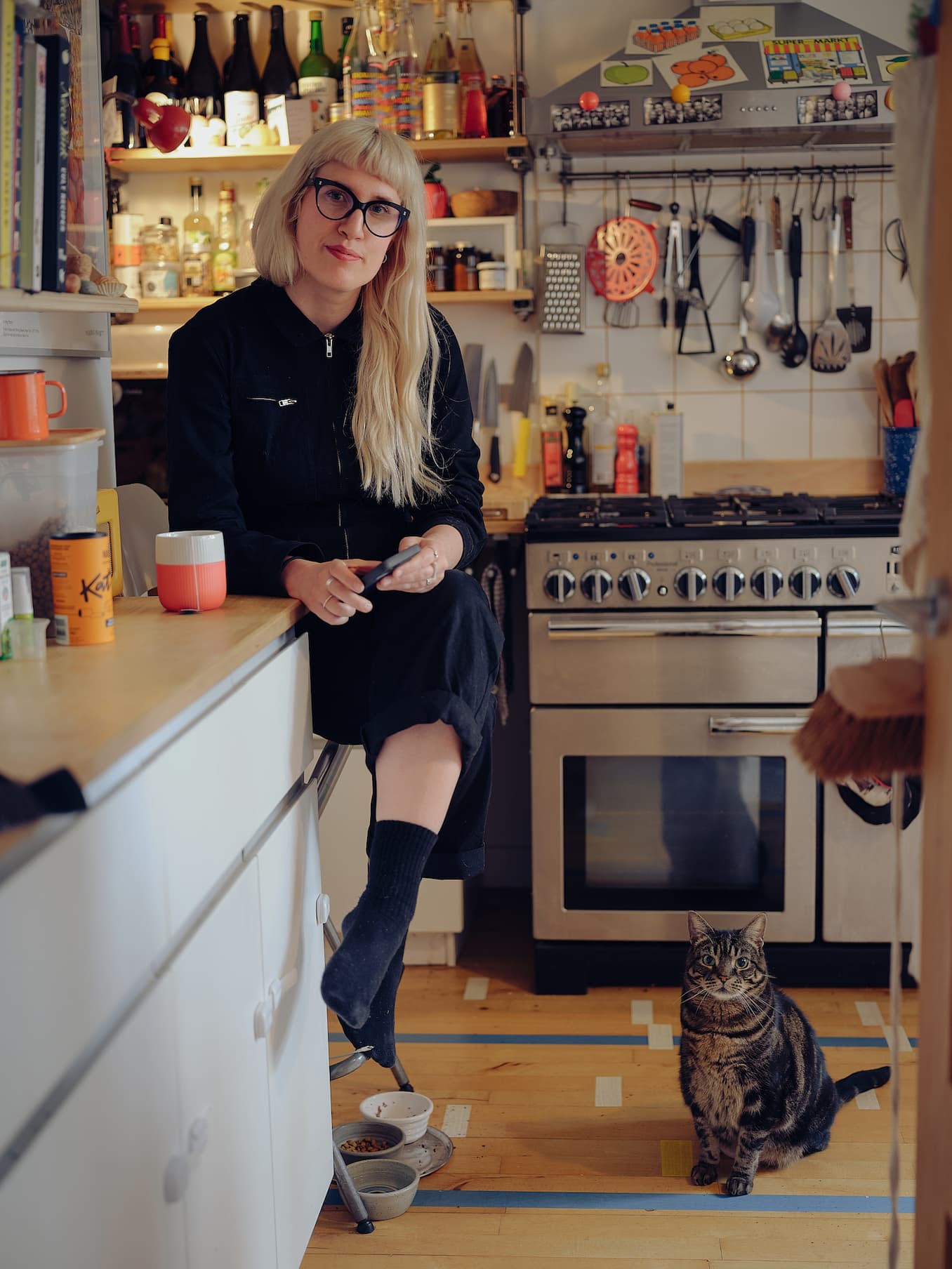 woman-in-kitchen-with-cat