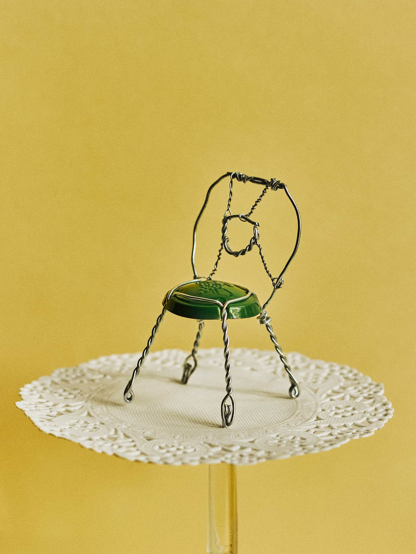 Chair made from a wine cap on top of a table