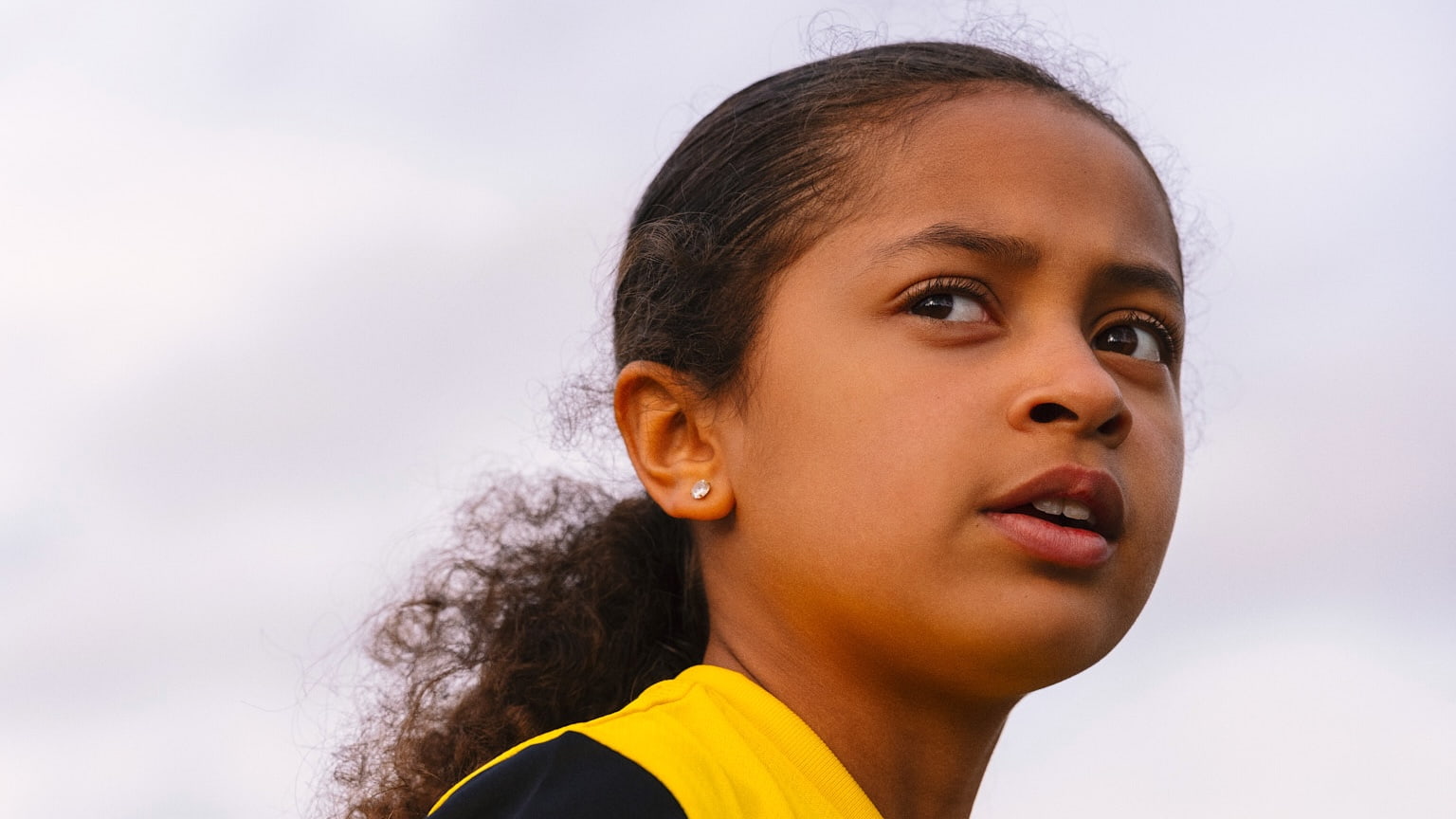 Close up image of the girl during her football training