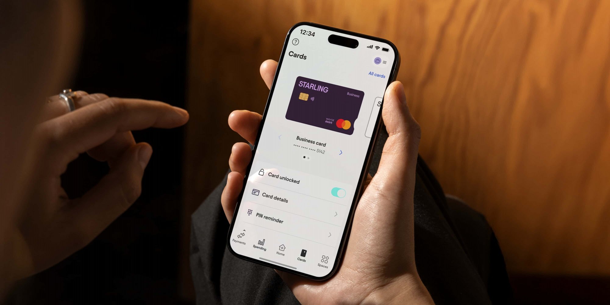 Customer using the starling app on mobile phone