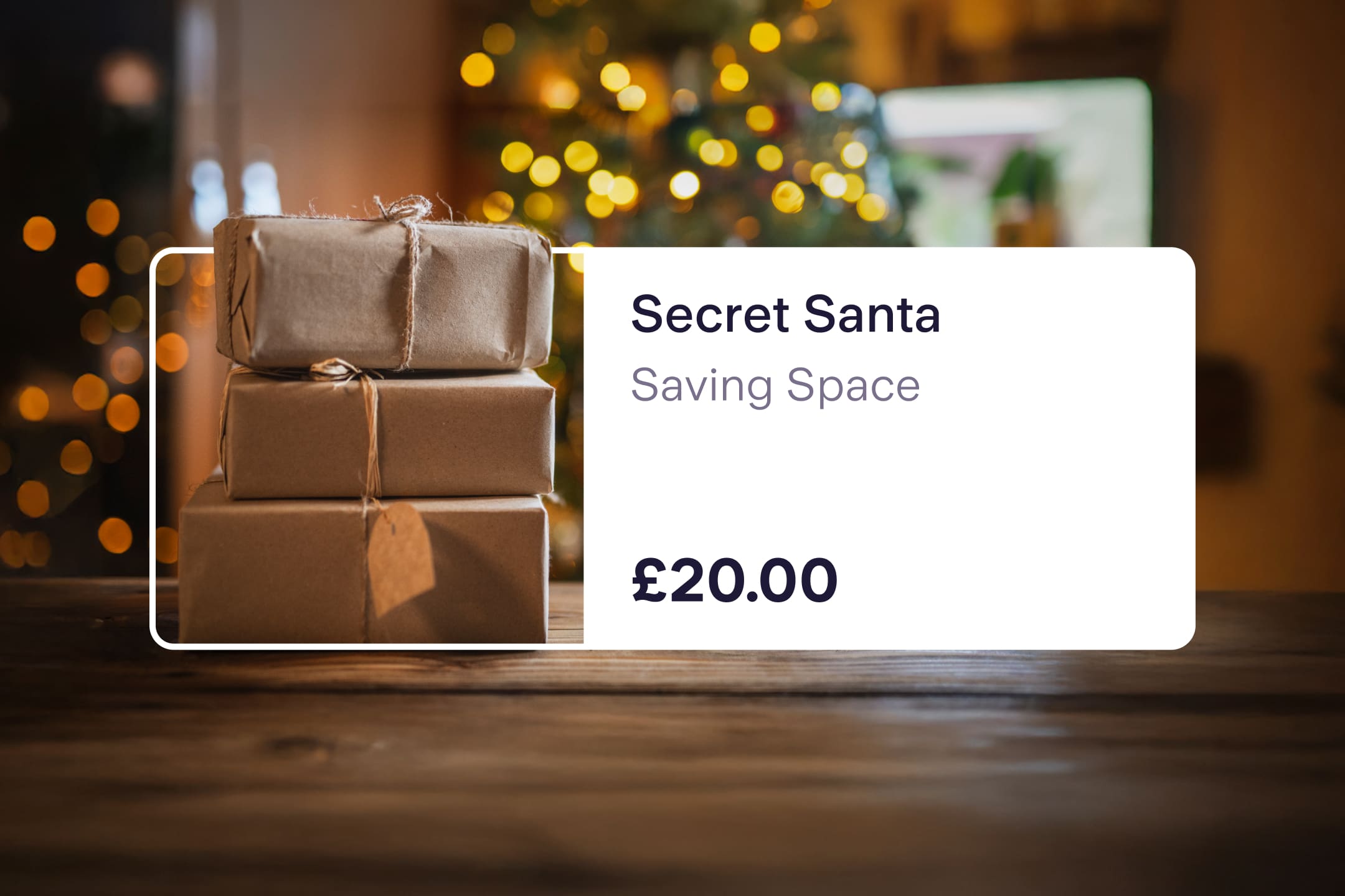 Image showing three parcels wrapped in brown paper within a Secret Santa saving space, a feature of the Starling app