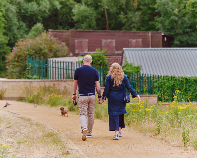 couple-walking-holding-hands