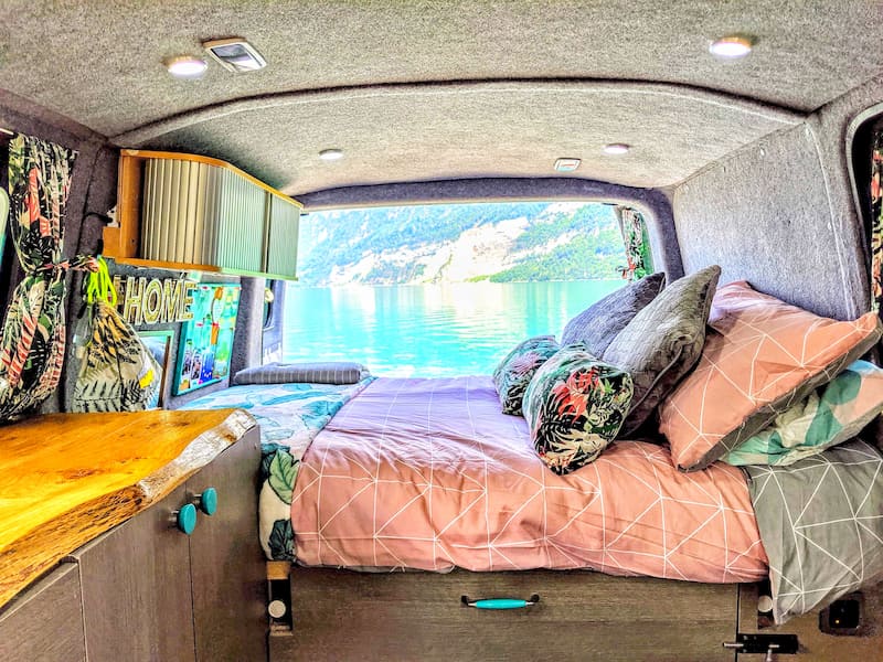 A view of a lake from their van in Switzerland