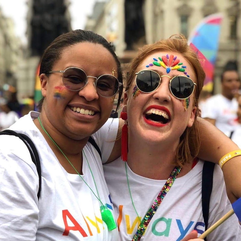 Kendra and Lily smile at Pride